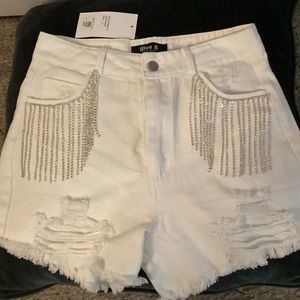 White Denim shorts with jeweled fringe on pockets
